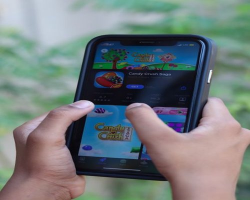 Smartphones visibly showing colourful games at an ONLINE Mobile Games Showcase in Perth