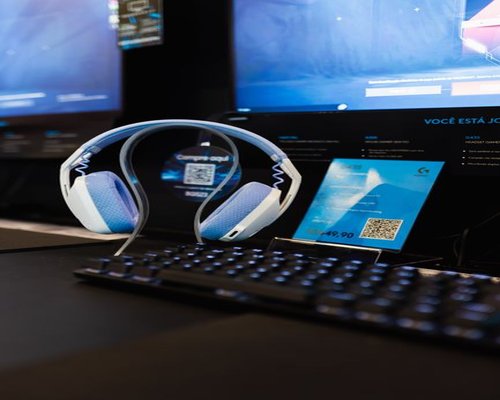 Gaming monitors, keyboard and headset arranged for a CROWN equipment exhibition
